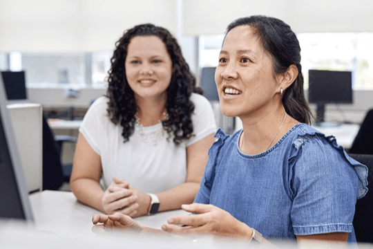 two woman in the office