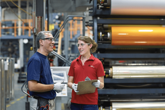 Man and woman in the factory