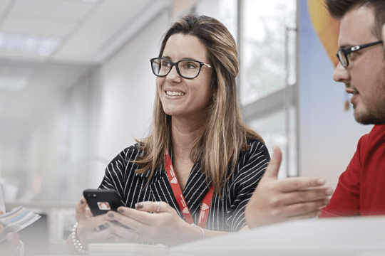 Woman with glasses having a conversation