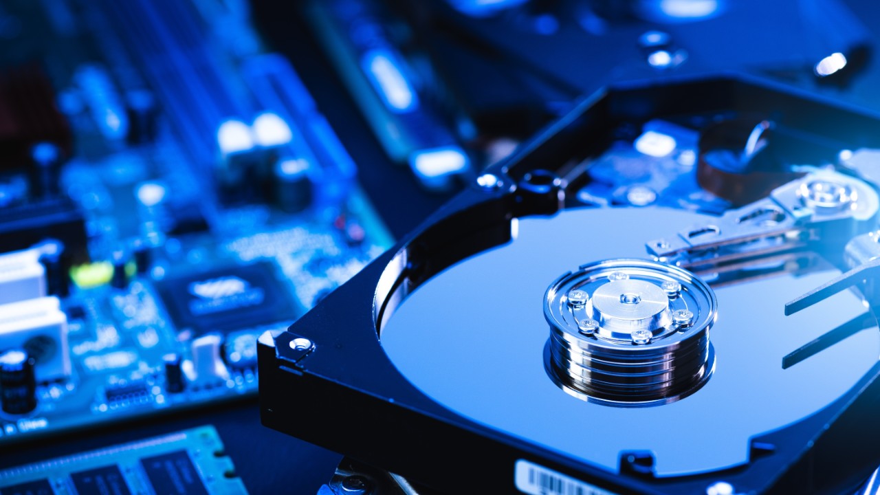 Photo of a computer hard drive. Avery Dennison provides adhesive tapes used for hard disk drive damping in the computer industry.